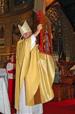 Bishop Michael Smith with the icon of St Genesius